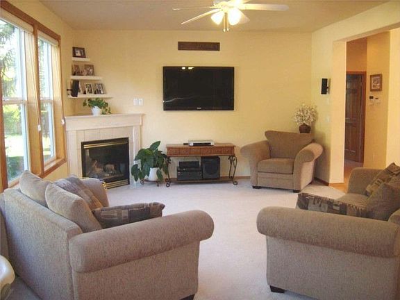 Spacious living room with a fireplace to cozy up to