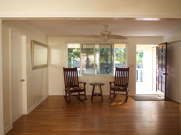 View from dining room to front door/living room.