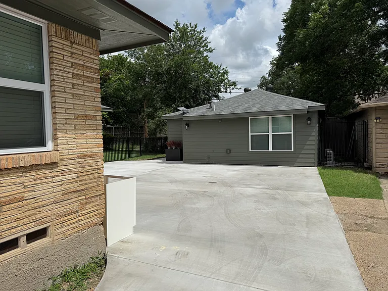 The Guest House includes 1 driveway parking spot