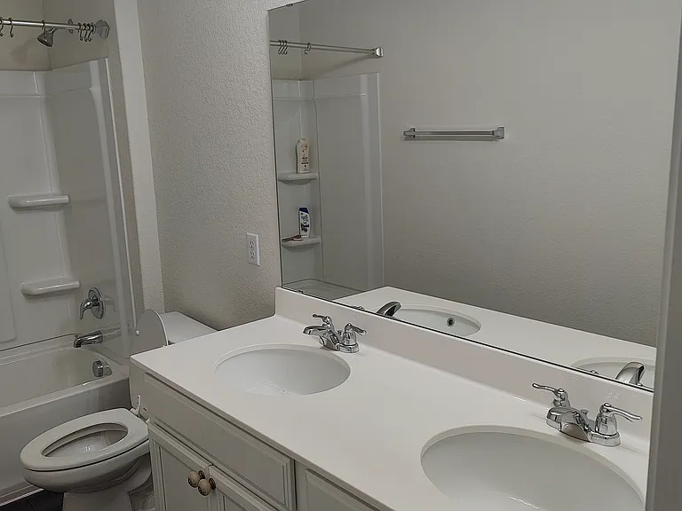Second Floor Full Bathroom with Double Vanity, Toilet and ShowerTub