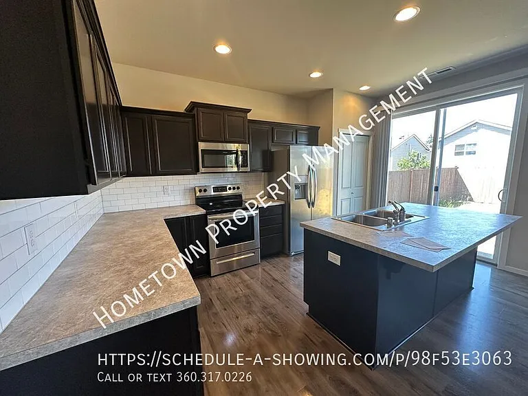6918 Oleander Ave NE — Photo 10