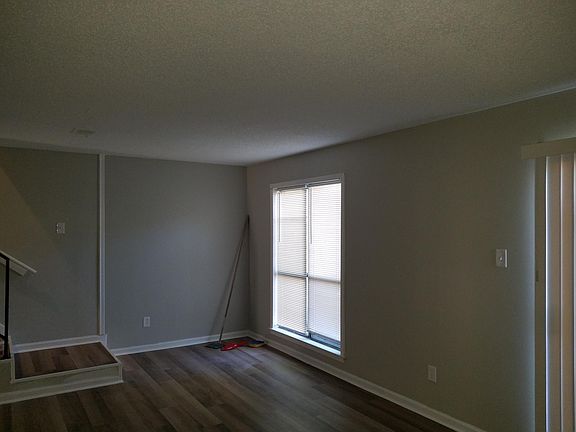 Great room with dining area and exist to patio.