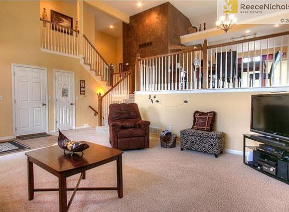 Great room opens into dining area and kitchen