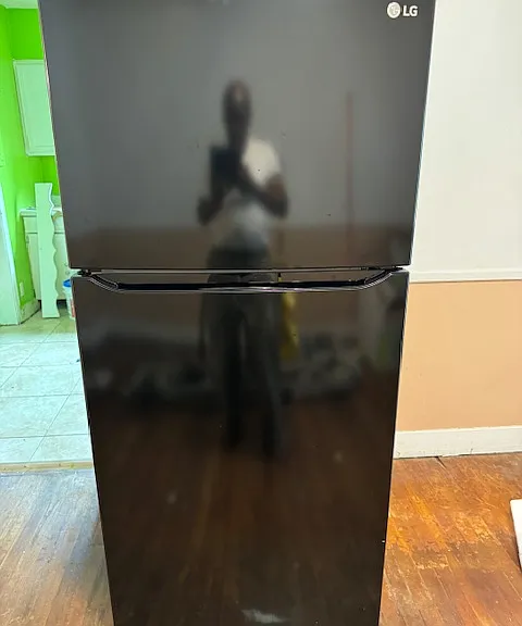 Brand New from COSTCO (Under two Year Warranty) LG Refrigerator! Cool as can Be.....