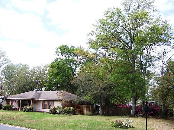 North and east portions of the front and side yard.