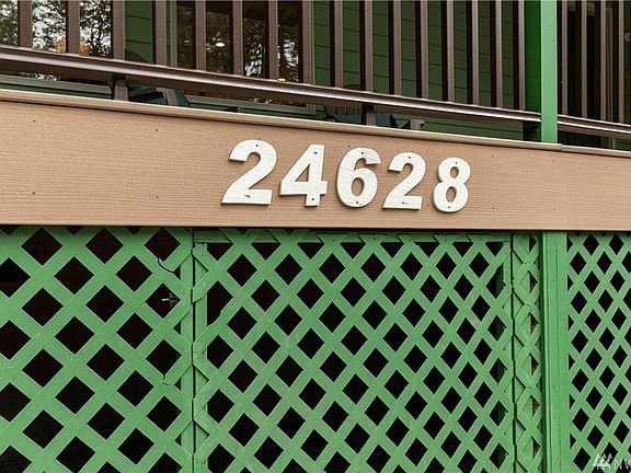 Beautifully updated inside, and has plenty of storage: under deck, 2 sheds, oversized garage and ample closets!