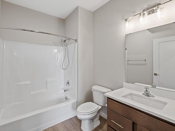 Large bathroom with plenty of storage and room for own shelving