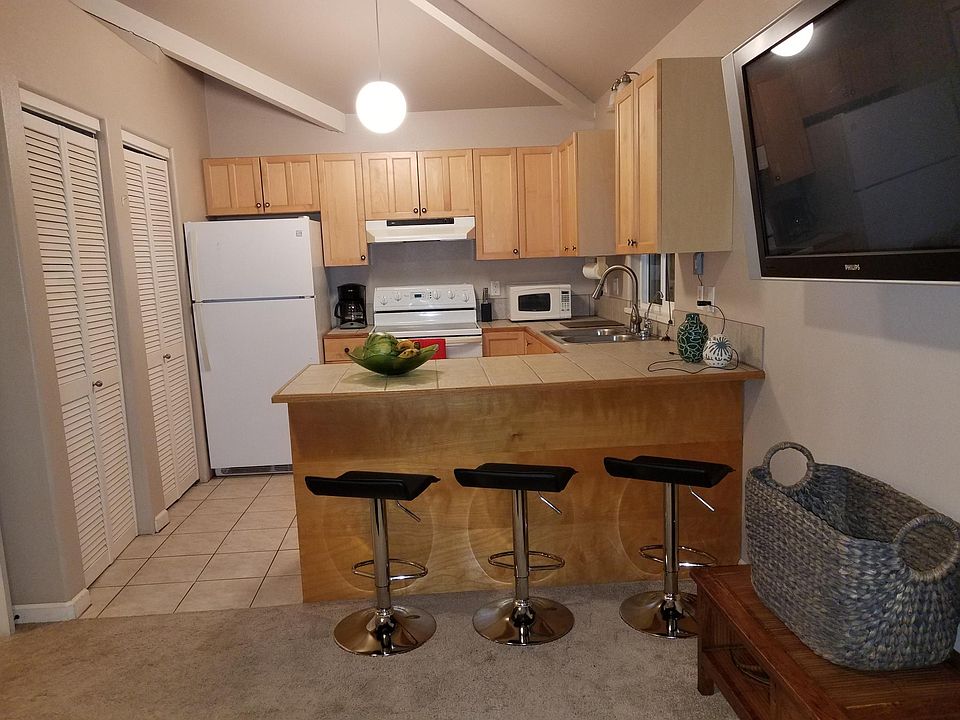 Living room and breakfast bar.