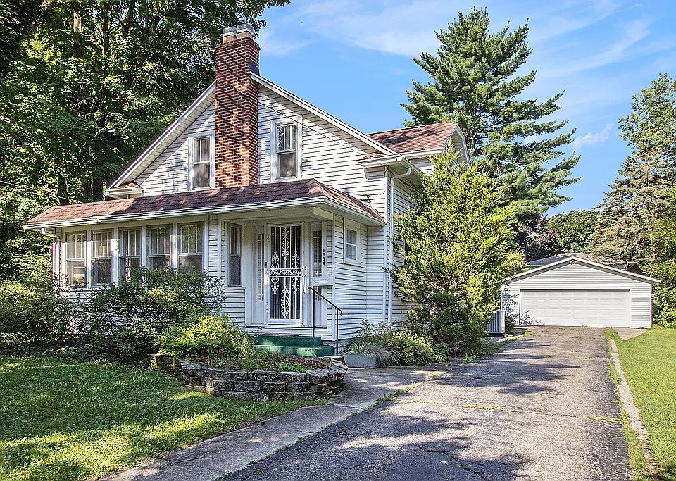 Two story home with large yard and two car garage