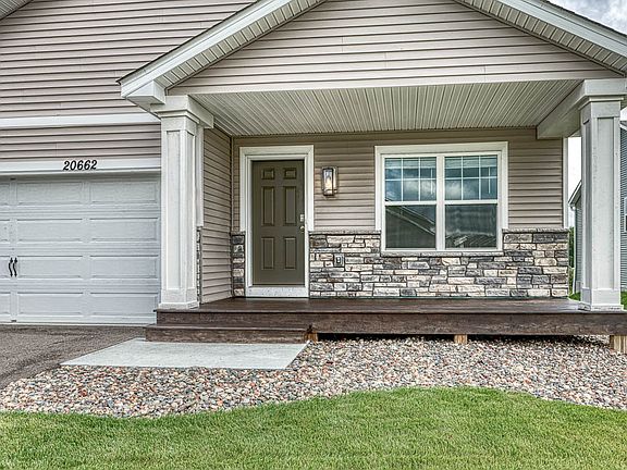 Front entrance has plenty of room to add a couple chairs and or a bench