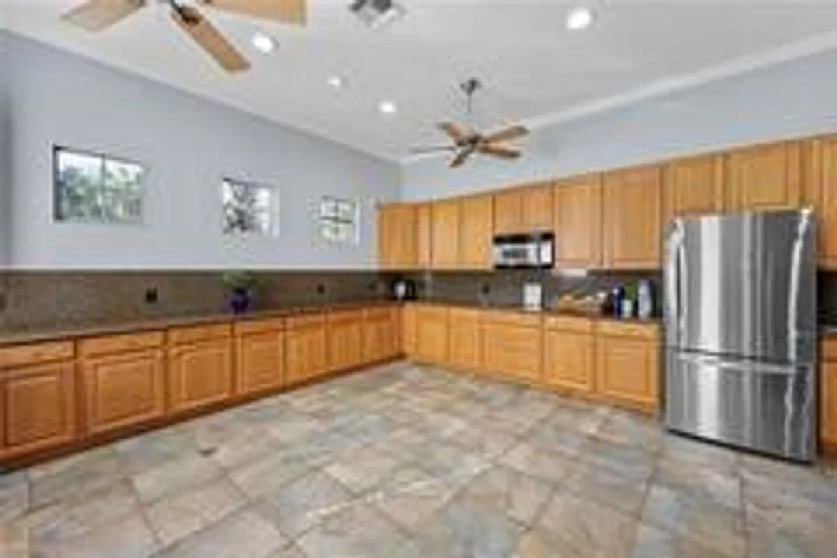 Building Photo - 2004 Tarpon Bay Dr N #101