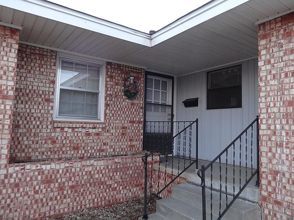 an inviting front door and built-in garden space