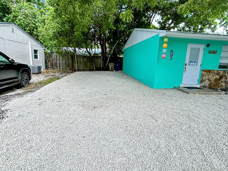 Poinciana Dr — Photo 2