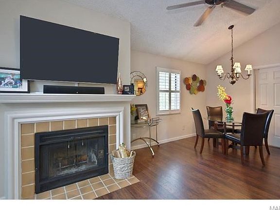 Fireplace in living room and separate dining.