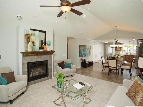 Vaulted Ceiling, Ceiling Fan, Gas Fireplace with Ceramic Surround, 
& In Floor Heat