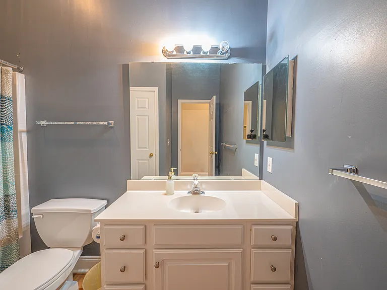 Additional bathroom located at the front of the unit