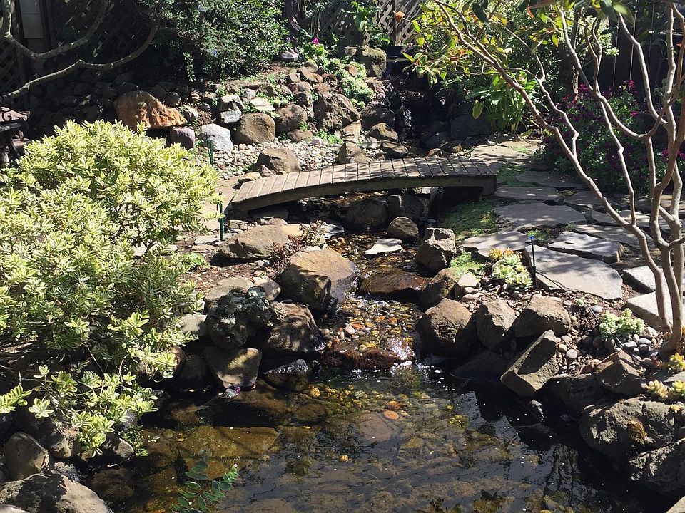 garden with babbling brook and pond.