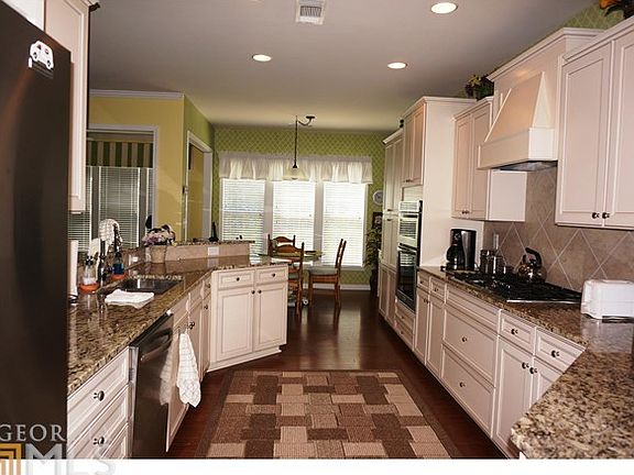 Kitchen with White Cabinets