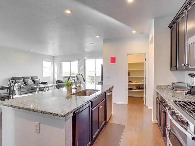 9373 Pitkin St — Photo 3