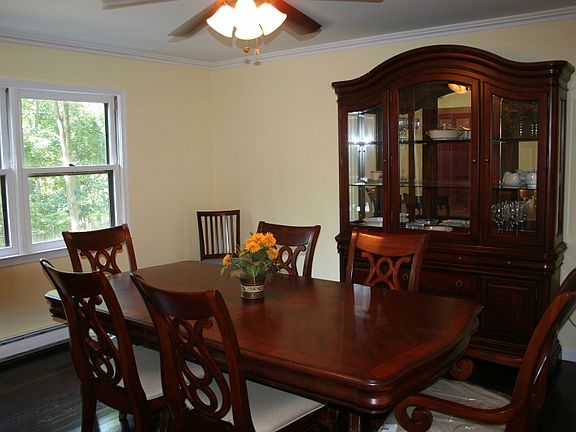 Bright open Dining Room with brand new hard wood flooring