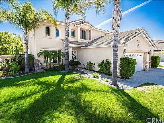 beautiful landscaping with water fountain feature