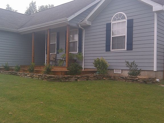 New landscaping and extended deck