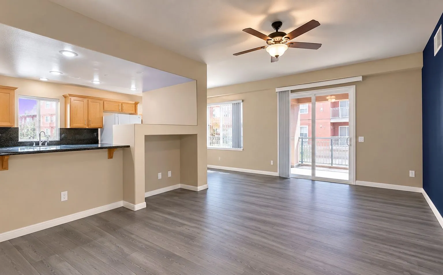 Fully Furnished Corner Unit with Spacious Patio — Photo 2