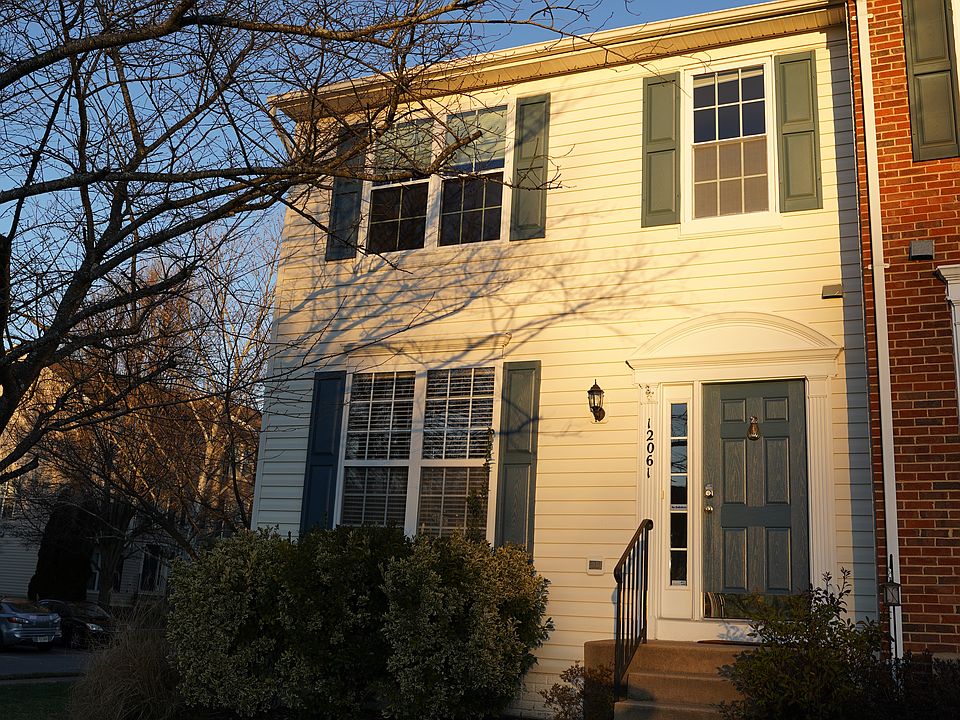 Front of house. Two parking spots