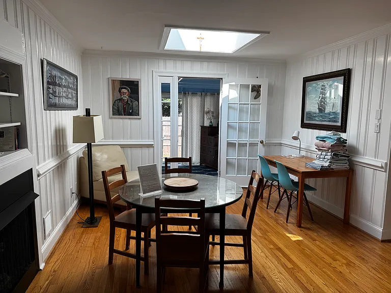Dining room table sits 4 along with a desk for remote work. All utilities and wi-fi included in monthly rent!