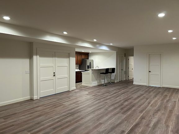 Living room with Wet bar/ Kitchen