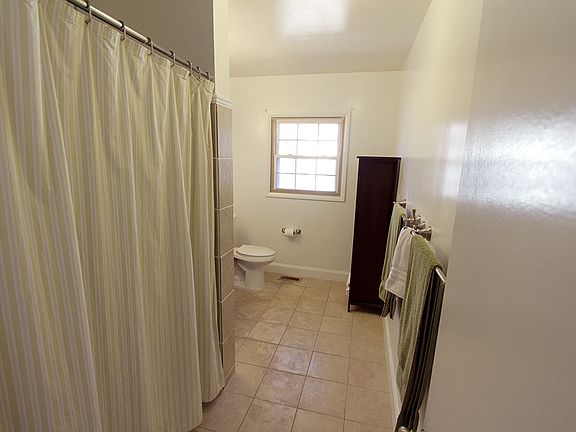 Large bathroom with tile