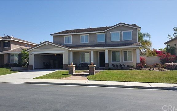 Another view of the front & Garage area for 4 CARS