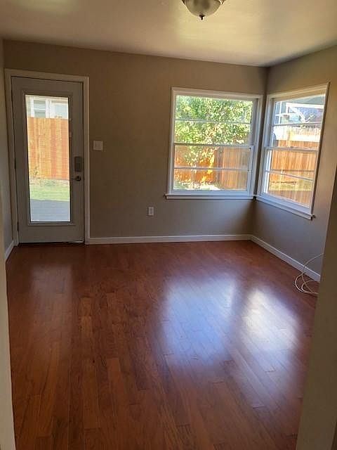 Living area opens up to large yard.