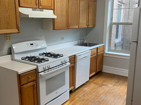 Kitchen with all white appliances
