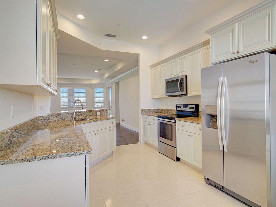 Designer Kitchen with built-in cabinets and Whirlpool Appliance package