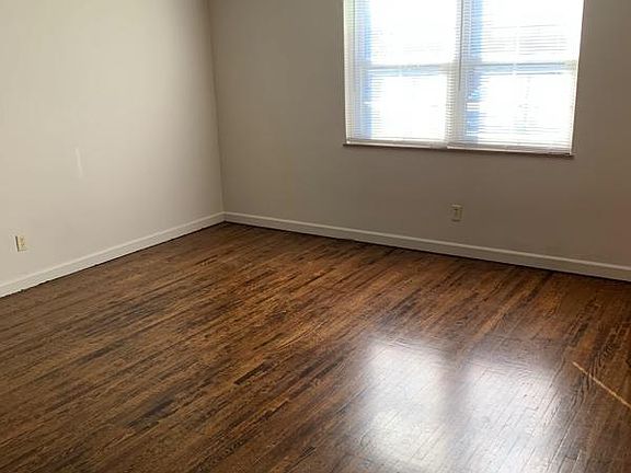 Living room with lots of daylight from large windows.