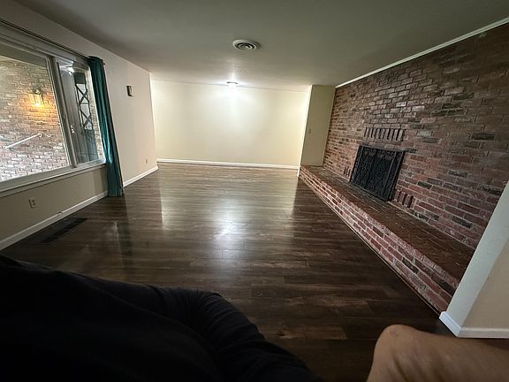 Living room with wood fireplace