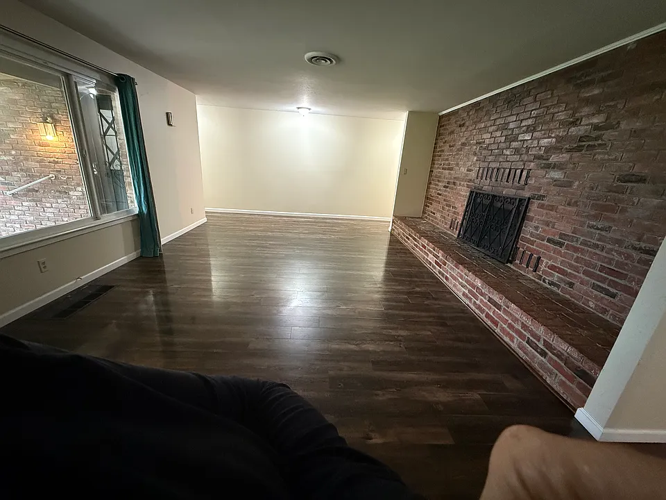 Living room with wood fireplace