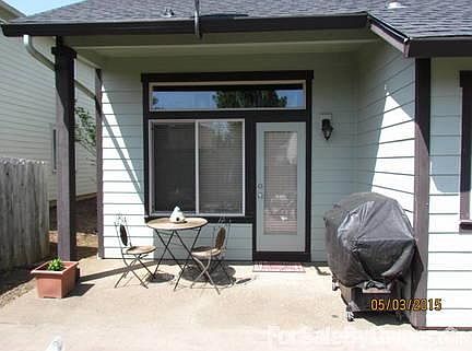 On the side of the house leading to the back yard.