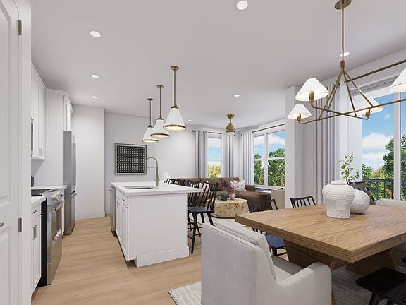 Dining Room Overlooks the Kitchen and Gathering Room