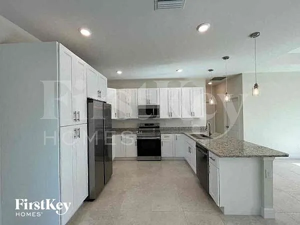 3062 NW 2nd Pl — Photo 5