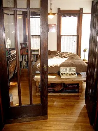 Bedroom. Accesible from livig room through french doors or from hall door.