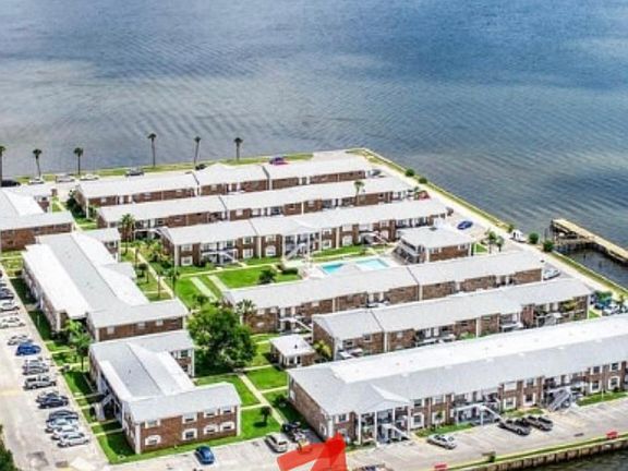 Your unit, bldg F, SW corner unit, bottom floor