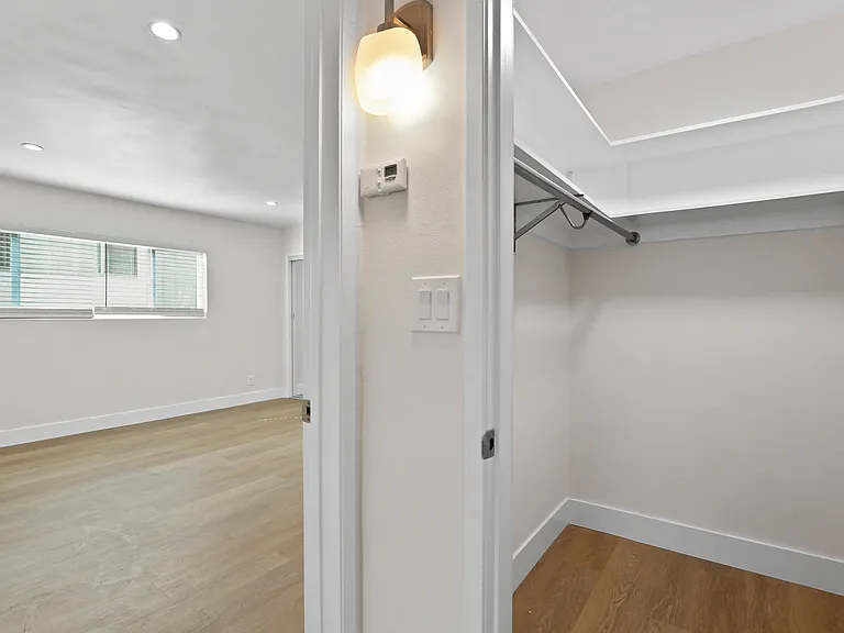 Walk-In Closet with Built-In Shelving