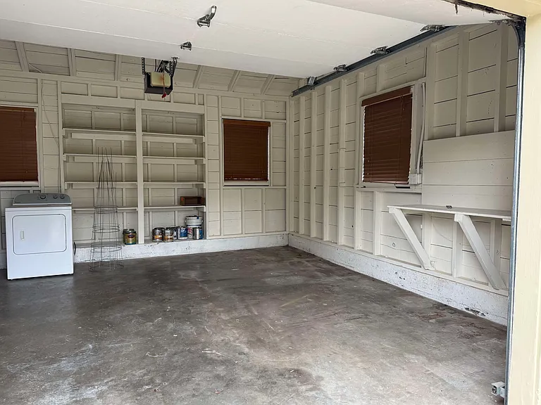 ATTACHED GARAGE, LAUNDRY AND STORAGE. OFF OF KITCHEN