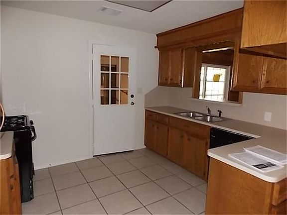 Kitchen is spacious and has new appliances