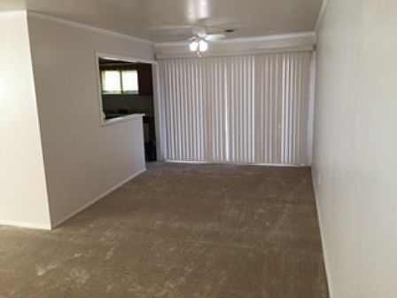 Dinning room with sliding doors that lead out to the back pa
