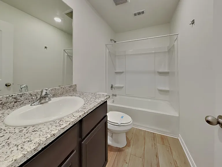Brightly lit bathroom features