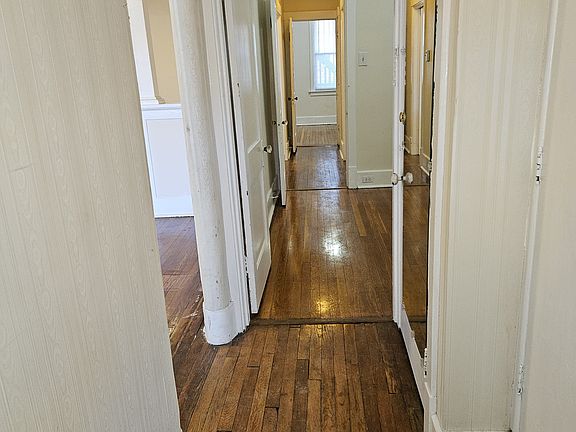 Foyer Entrance Leads to a Hallway Back to the Bedrooms