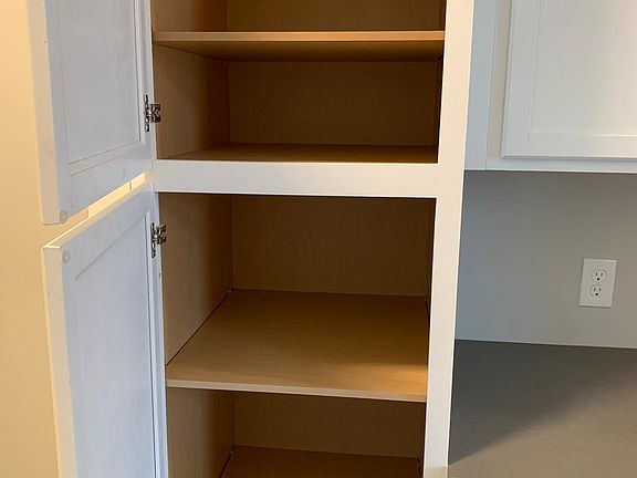Tons of shelves in the cabinets